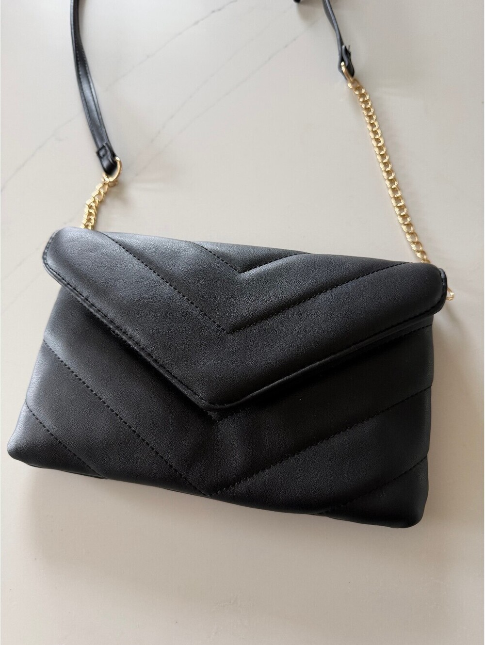 Black Quilted Envelope Crossbody Bag with Gold Chain Strap